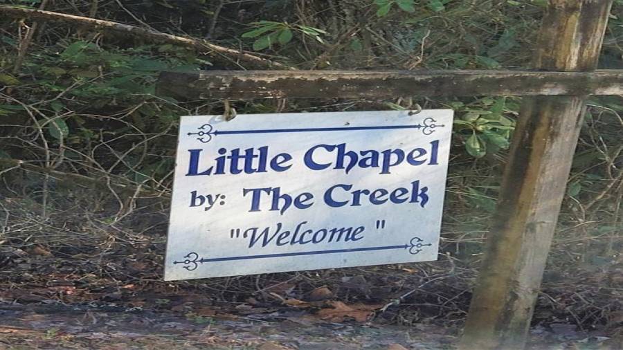 Turn right at the church sign. Property is just a short way on the left.