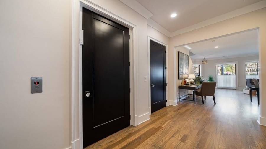 The elevator is this first door on the left shown on the main level just inside the garage.