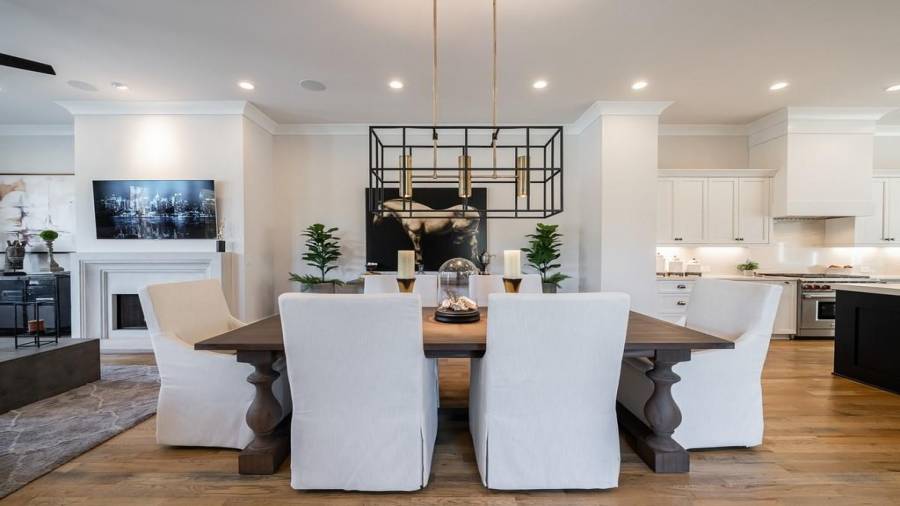 On the main level, you will see the dining room in the middle with living to the left and kitchen to the right.