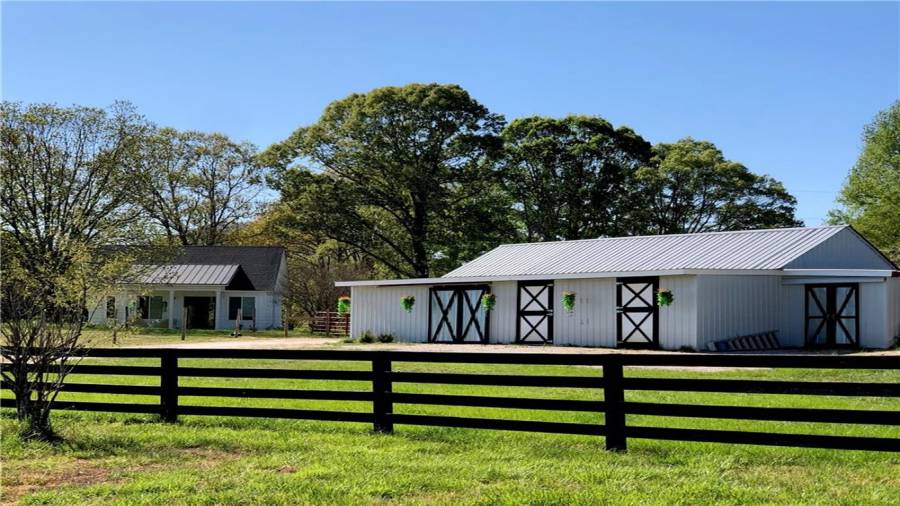 View of barn and cottage from road (zoomed in)