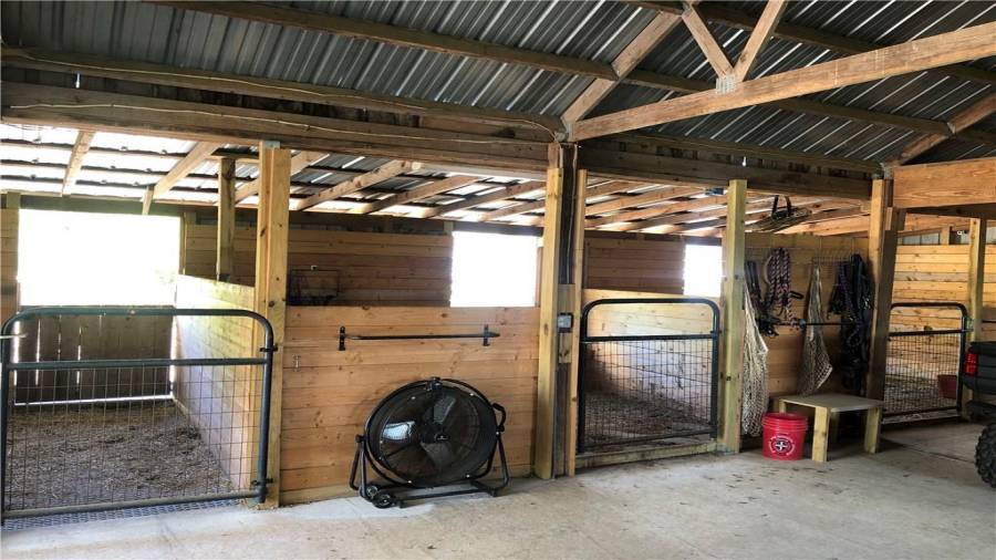 3 Stalls on the back side of barn.