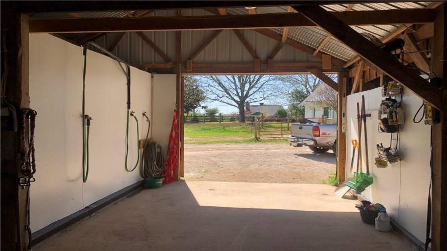 Wash stall from the aisle shows the water supplies. Walls are of pvc and are easy to keep clean.