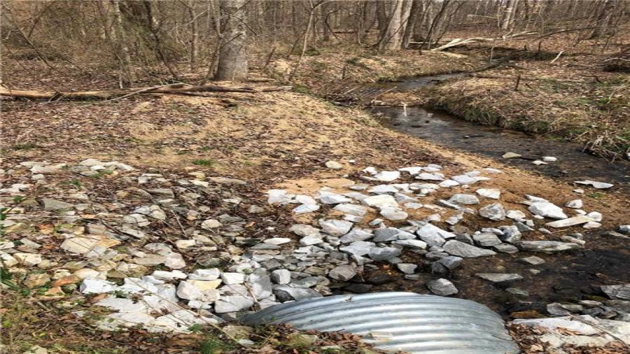 Creek culvert on a normal flow level