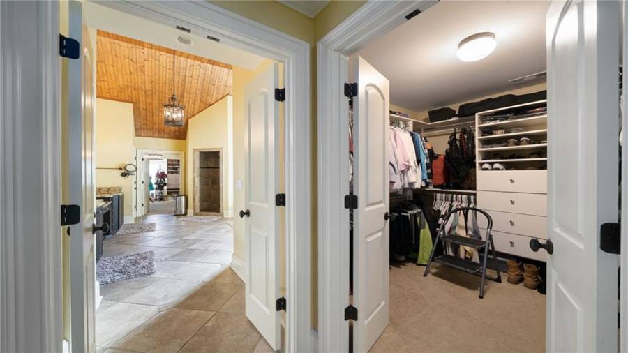 Two Owners closets with custom shelving