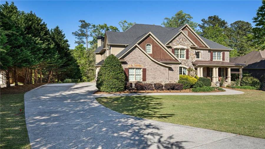 Nice long level driveway to 3 car garage!