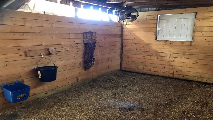 This is the largest stall 10x16 with an extra window and a dutch door to the 2 small paddocks behind the barn.
