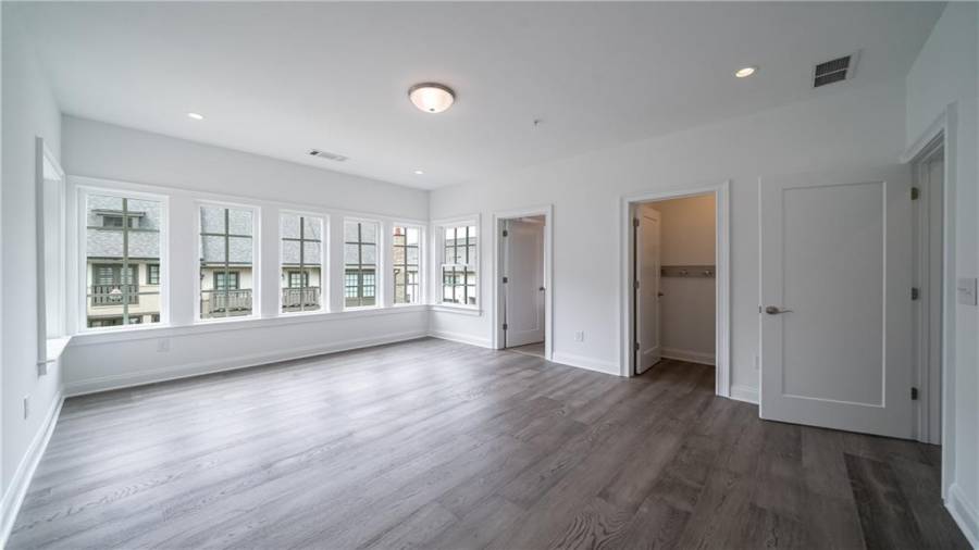 View to the closet and guest bath from the secondary bedroom
