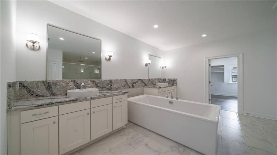 Wow! What a owners suite bath!