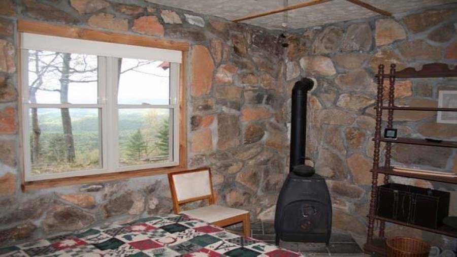 Window view and a wood stove