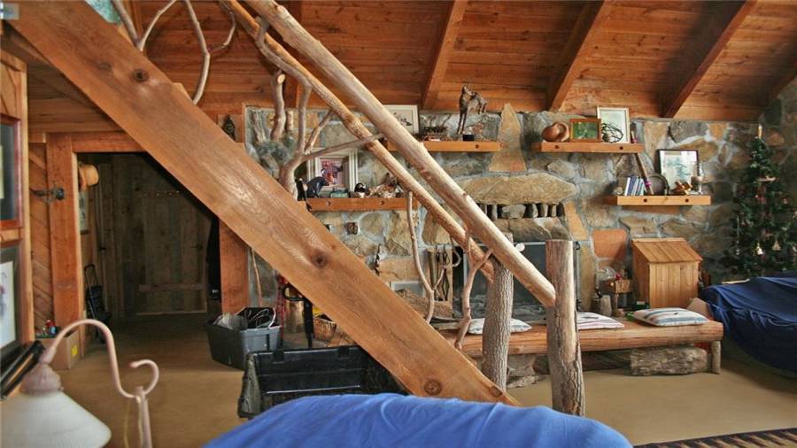 Staircase is hand-wrought and hand fitted