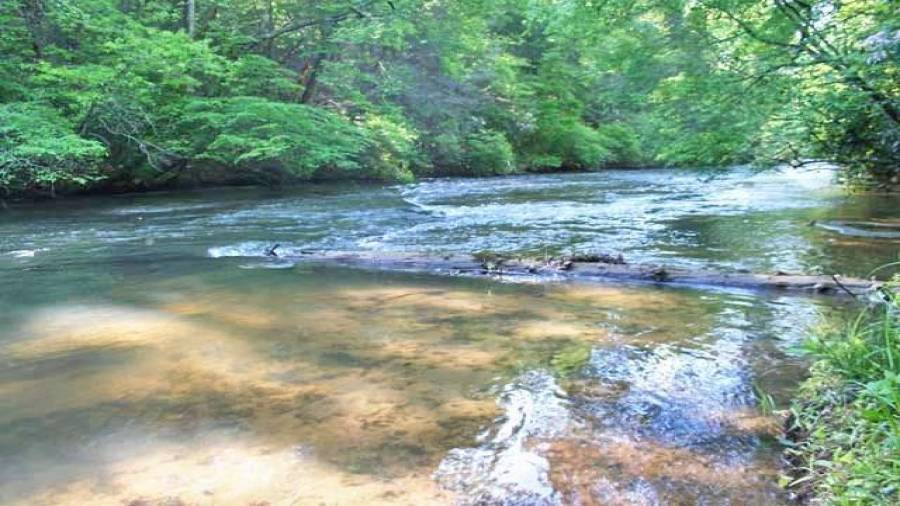 The beautiful Etowah River through the property