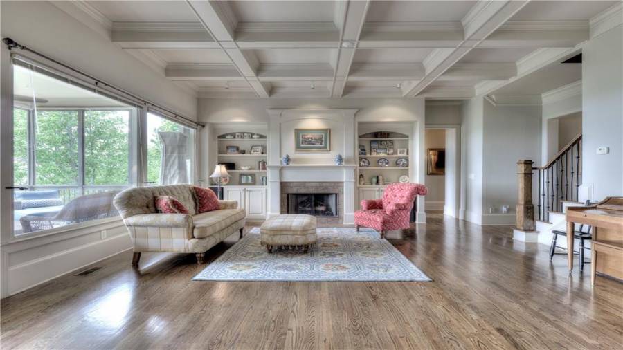 Heavy moldings, superb custom detailing and gorgeous hardwoods throughout the main living areas. Bring the outdoors in (or indoors out?) by stepping out on the screened Porch!