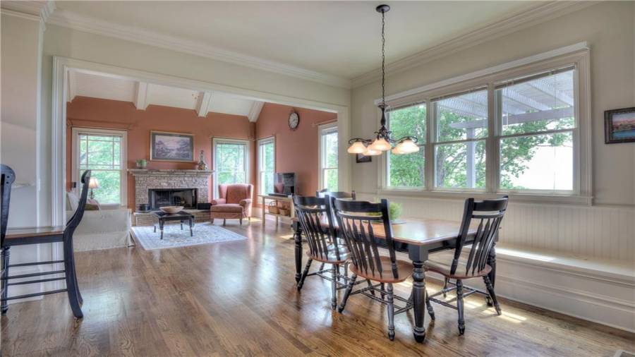 Huge Dining area with bench seating and room for a long table for family to enjoy!