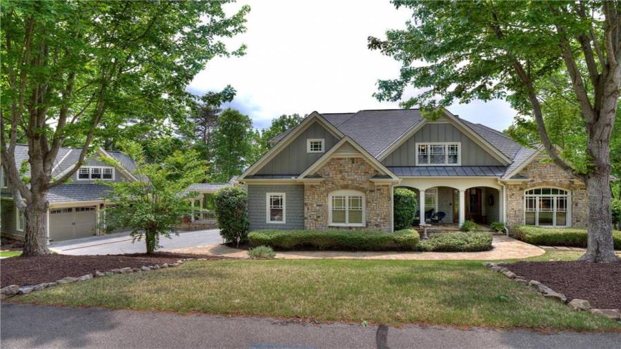 Gorgeous custom built Craftsman home located on Red Top Mountain with a view to cherish! Quality construction by Scott Homes, approved builder at Waterside Estates and Village at Waterside.