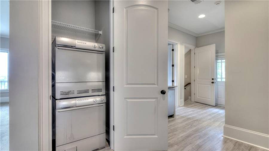 Washer and Dryer on Terrace Level. Luxury Vinyl Plank (LVP) flooring, where it counts.