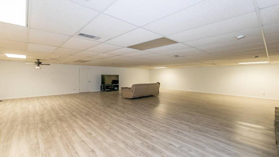 Cavernous finished terrace level space perfect for entertaining