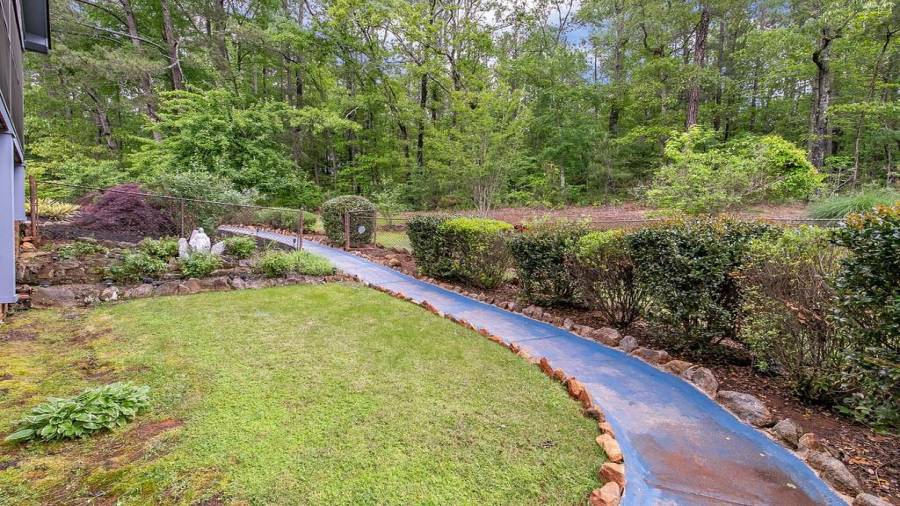 Beautiful landscaping. Back walkway