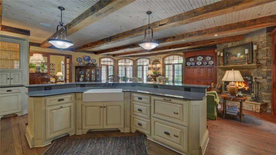 Additional view of the kitchen island and sink.