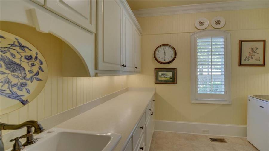 Spacious utility room with lots of additional storage space.