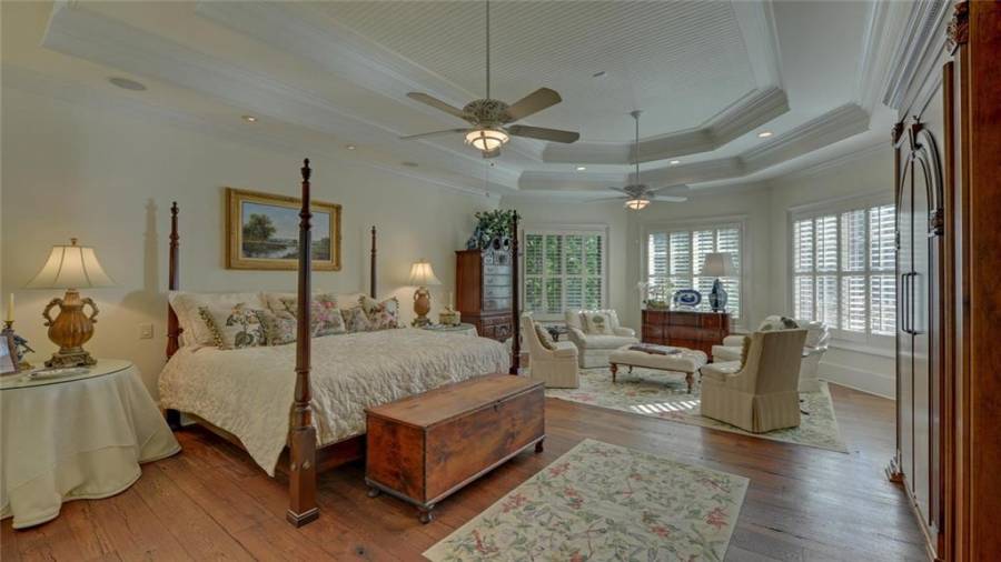Beautiful Master retreat featuring a sitting area, double trey ceiling and a spacious walk-in closet.