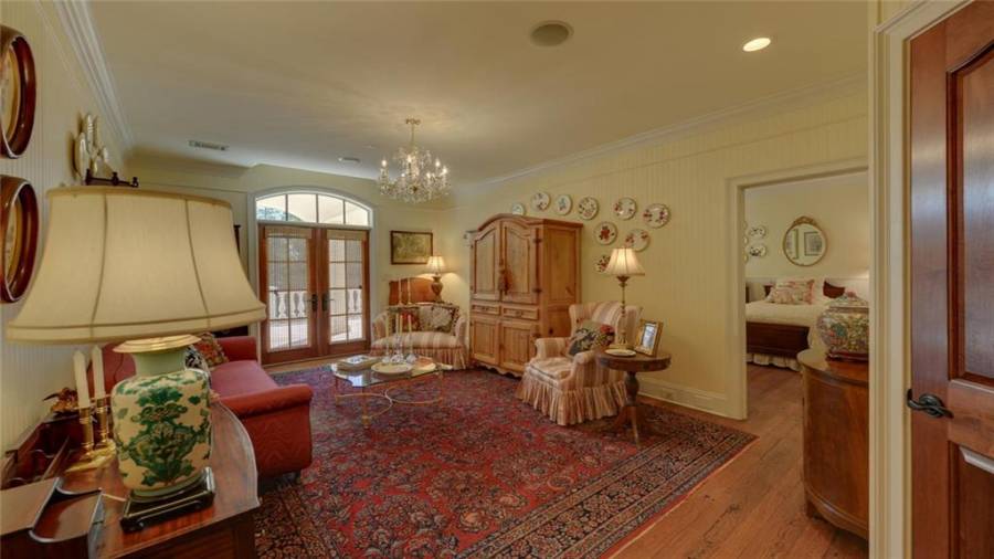 This cozy sitting area is flanked by two ensuites on the upper level.
