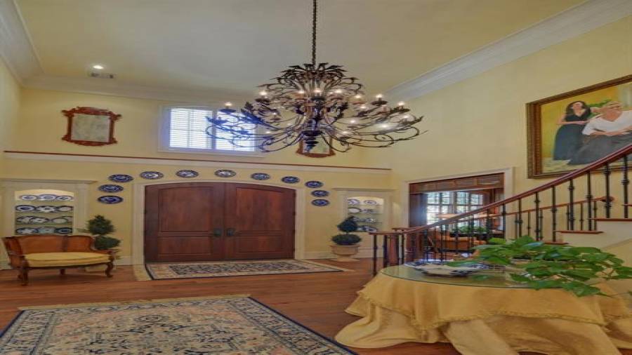 A two story grand entry foyer welcomes you in to this rare find.
