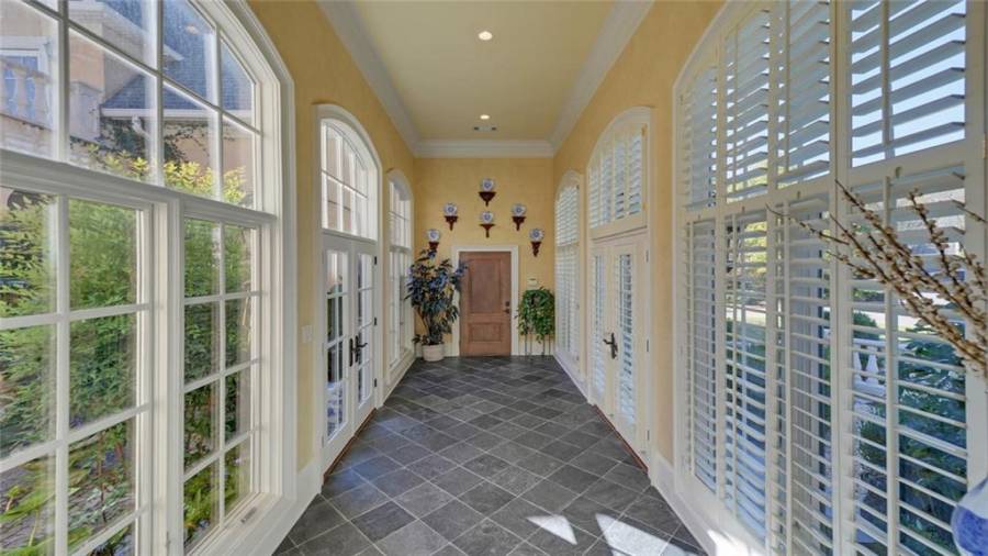 Hallway leading to the covered veranda and garage.