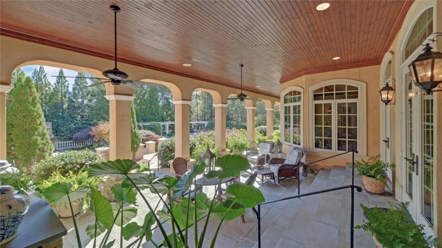 Enjoy plenty of outdoor living and entertaining space options.  This area is accessible from the living room.  Open the double doors and create lots of open space when entertaining or hosting family functions.