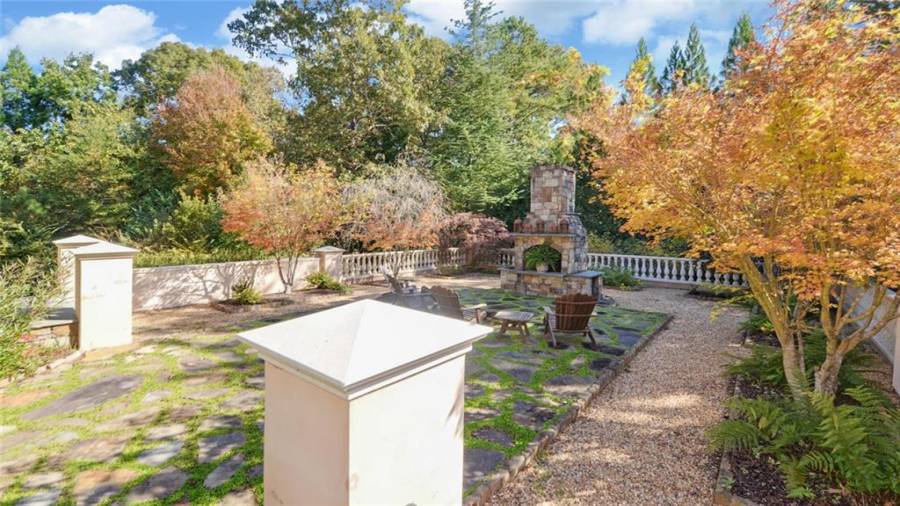 Sit and relax enjoying this fireside garden area.