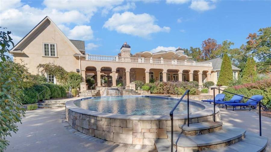 View of the exterior of the home from the pool area.