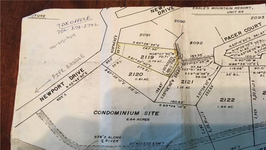 These are easy directions to the property going north from the FIFE Bridge and just past the condominiums. The property is number 2119 and is 3/4 of an acre with a mostly gentle slope to Newport Drive! Perfect for a basement home!!