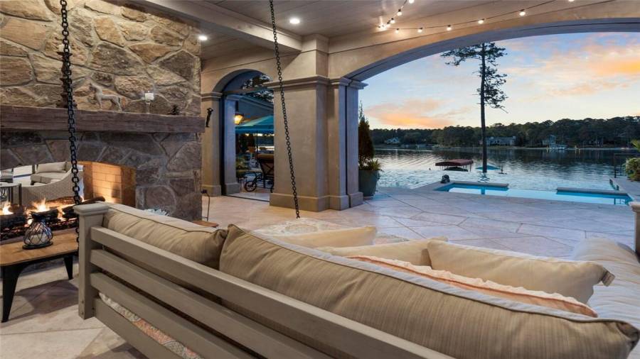 The lanai is surrounded by phantom roll-down screens.