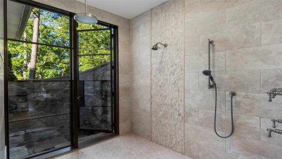 Indoor shower leads to outdoor shower.