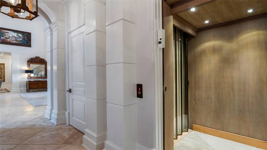 Elevator accesses upstairs living spaces.