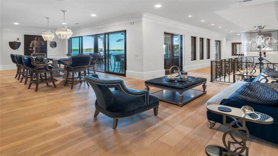 Upstairs bar and lounge with access to outdoor living area.