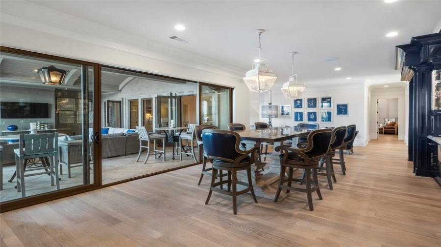 Sliding doors open to outdoor living space.