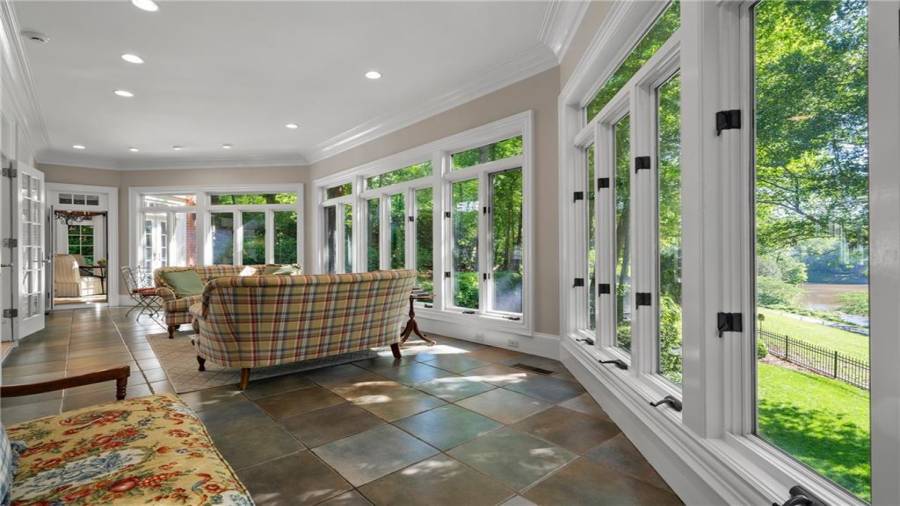 Another viewpoint - the family/great room is on the left and the kitchen is straight ahead.  And...on the right is a glimpse of the view!