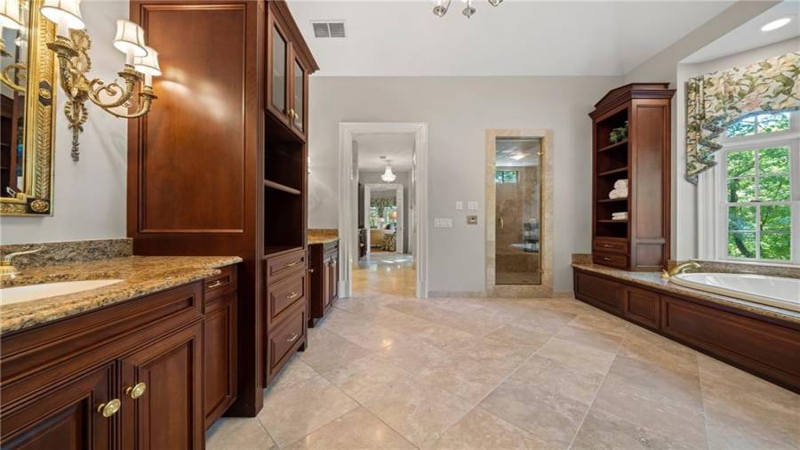 Handsome cabinetry throughout.  Elegant light fixtures remain with the home.