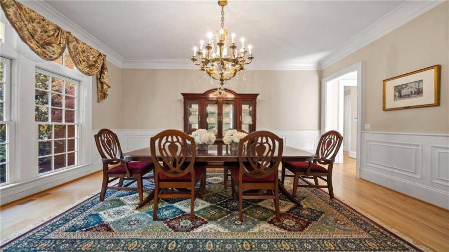 We have a few more rooms to go on the main floor.  This is your separate dining room off foyer - on the right side is the entrance into kitchen.