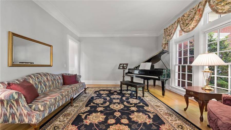 This is your music room or could be a small living room.  Great windows!