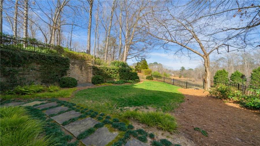 These next photos are various angles of the back of the property.  It is truly amazing.  In this one, you can see the pond!