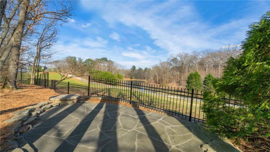 Can you visualize a few Adirondack chairs?  See the pond??