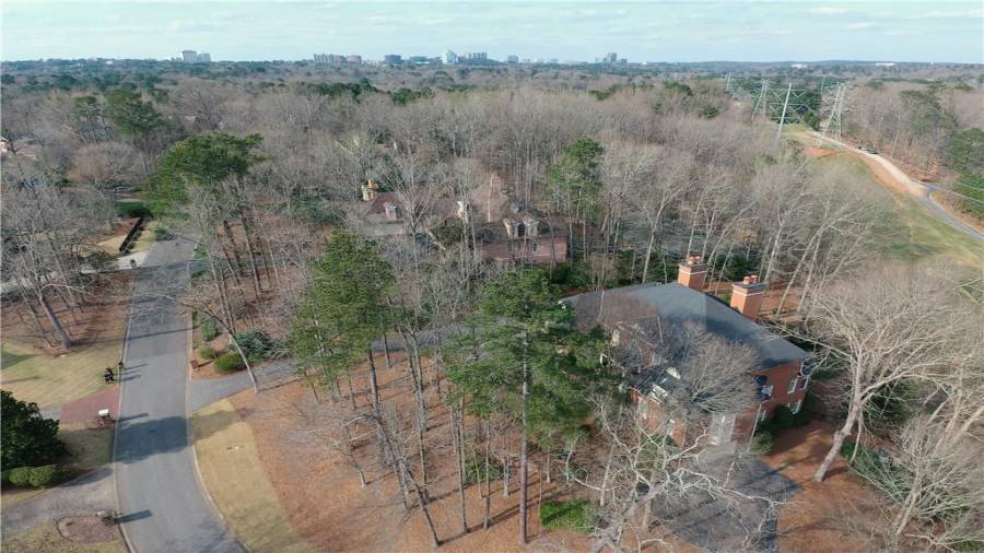 An aerial shot illustrating the scope of the property...notice the privacy and nothing but nature on the left side of the home!