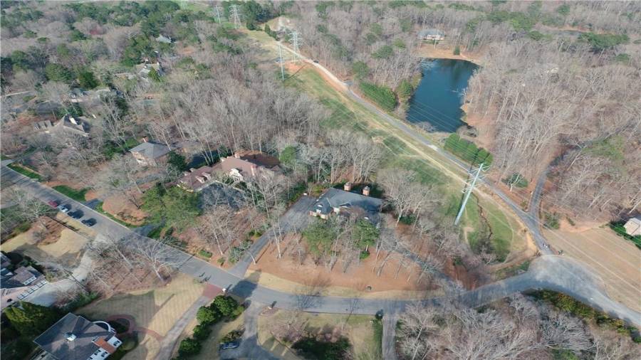 Another aerial shot showing how all the lots are substantial in size with privacy for all.  And....look at that pond!
