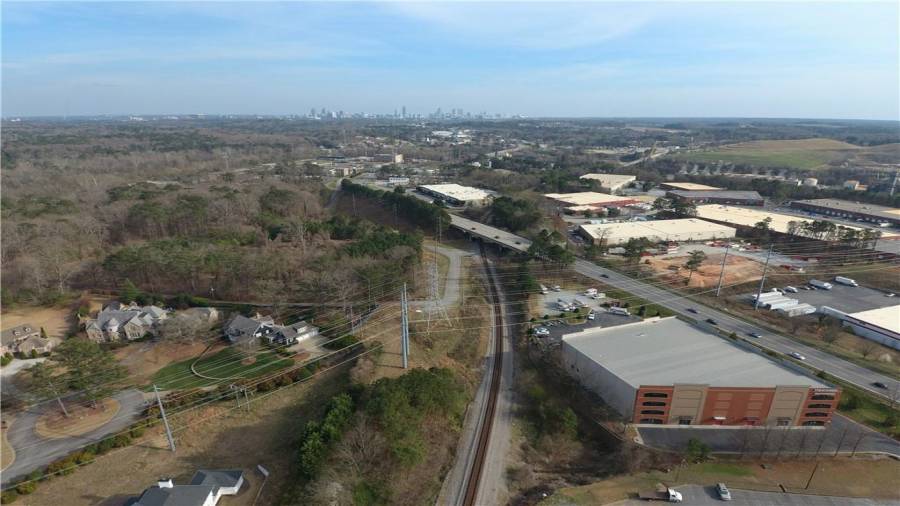 If you are not familiar with Vinings - it is one of the most convenient places to live...regardless of your daily routine.  You can be at the Atlanta airport in 20 miles, Truist Park is 6 miles, The Lovett School is 3 miles, Trinity School is 5 miles, Westminster School is 4 miles, Governors mansion in central Buckhead is 6 miles, Phipps Plaza and Lenox Square shopping malls is 8 miles, downtown  is 9 miles and Ponce City Market is 13 miles.  And in just 3 miles is Vinings Jubilee with all the wonderful restaurants and shops. All mileage is approximate.