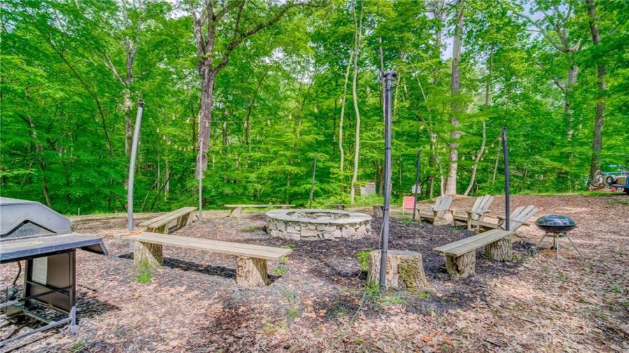 Fire pit with outdoor lighting