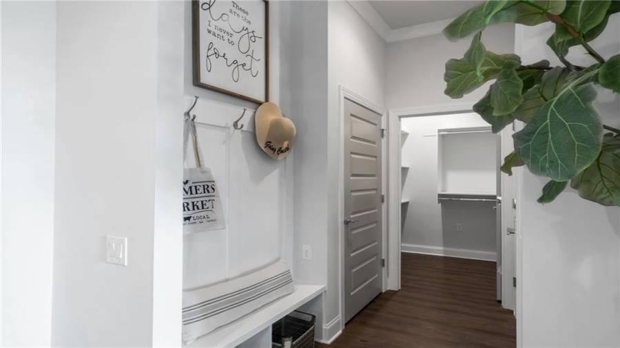 This all Purpose Mudroom is So Functional!  Drop off your Coats, Bag and Keys.  The Bench is great to sit down and put your shoes on.  Just a great use of space to help you stay Organized!