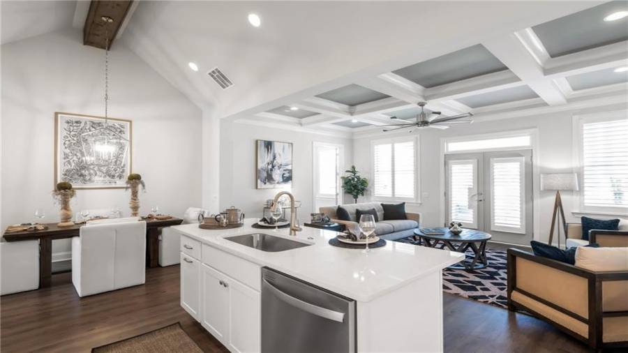 Our Cottages offer Included Designer Features.  Vaulted Ceiling in the Kitchen and a Custom Trimmed Coffer Ceiling in the Great Room......