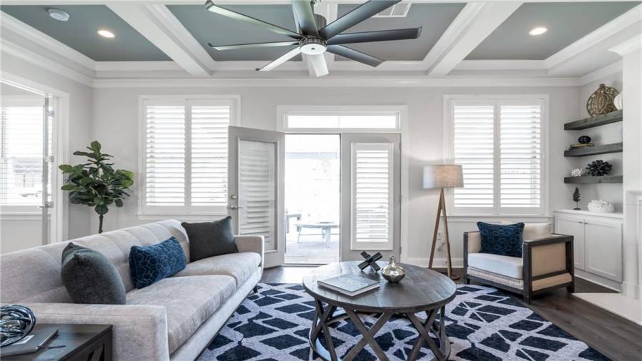 Stunning French Doors Lead you out to a Pavered Patio. Designer 4 inch Custom Shutters Available ask Agent for Details......