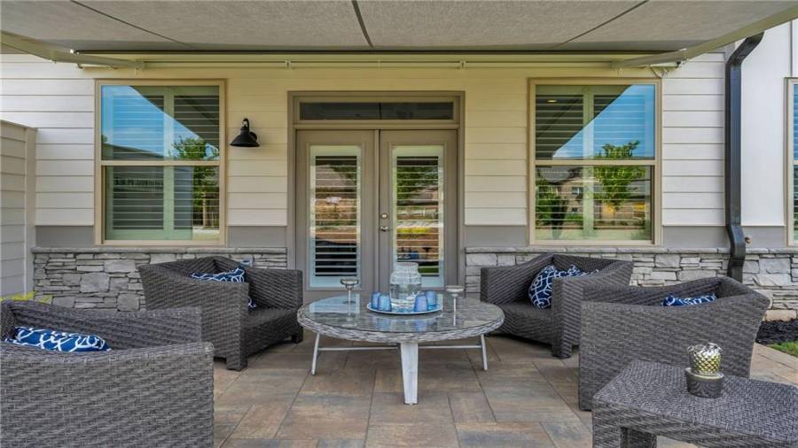 Our Optional Retractable Awning shown here...... Cover your patio space with the push of a button!